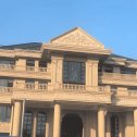 普洱黄金麻别墅外墙干挂石材效果示例