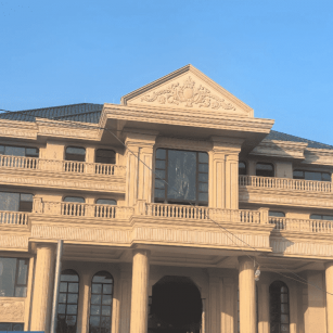 普洱黄金麻别墅外墙干挂石材效果示例