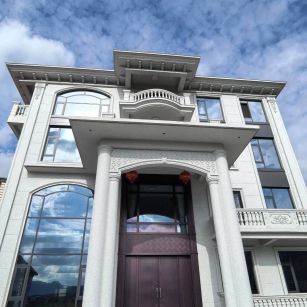 普洱白麻别墅外墙干挂石材效果示例