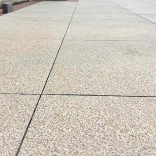 普洱 黄金麻花岗岩石板材荔枝面地面铺装效果