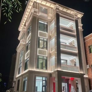 普洱 芝麻白花岗岩别墅外墙夜间效果