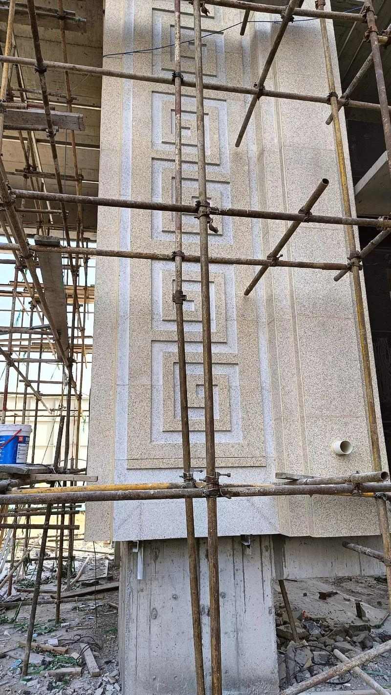 普洱 黄金麻花岗岩别墅外墙干挂回纹造型效果