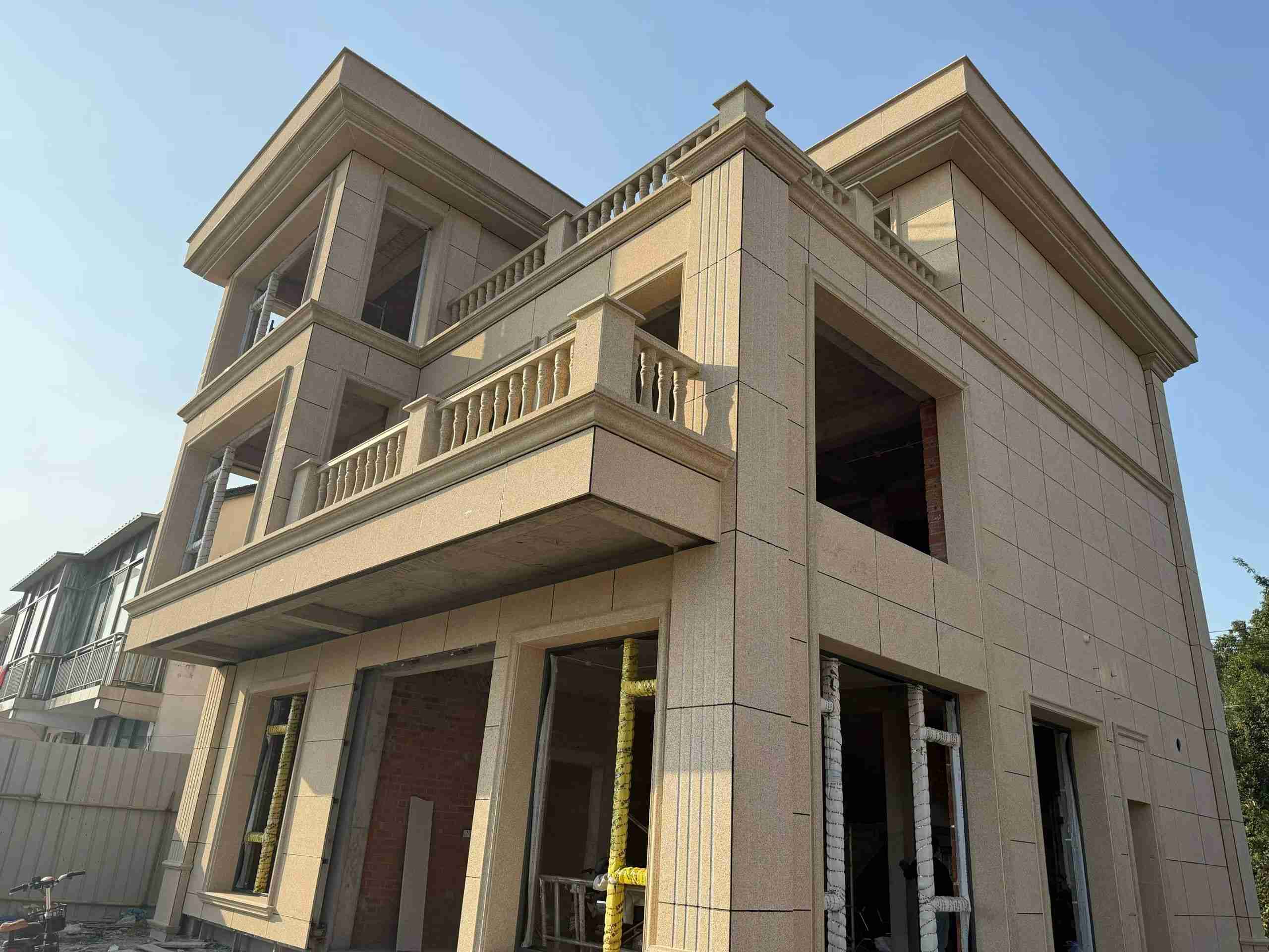 普洱 黄金麻花岗岩石材荔枝面外墙干挂效果展示